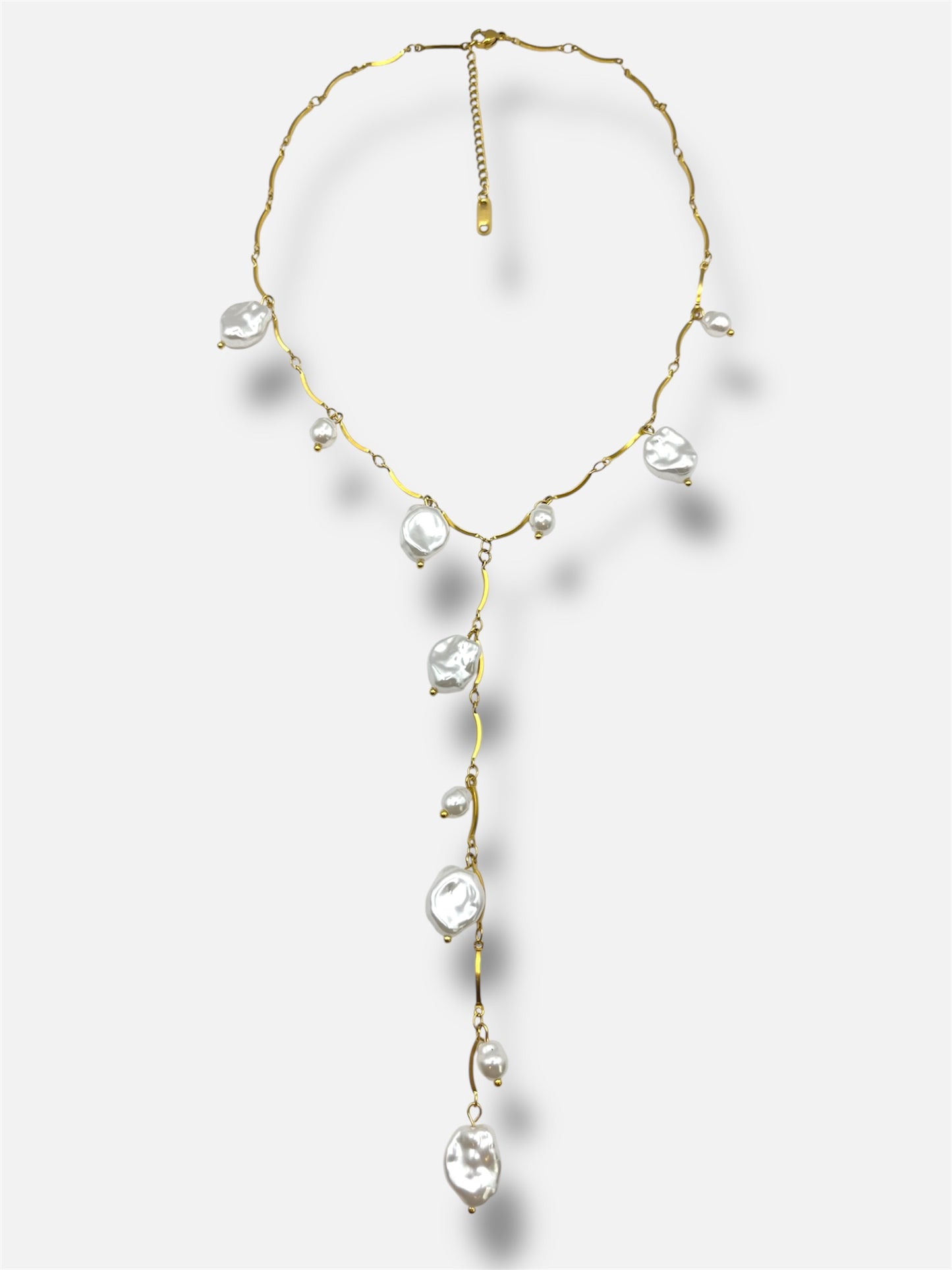 Collar perlas.