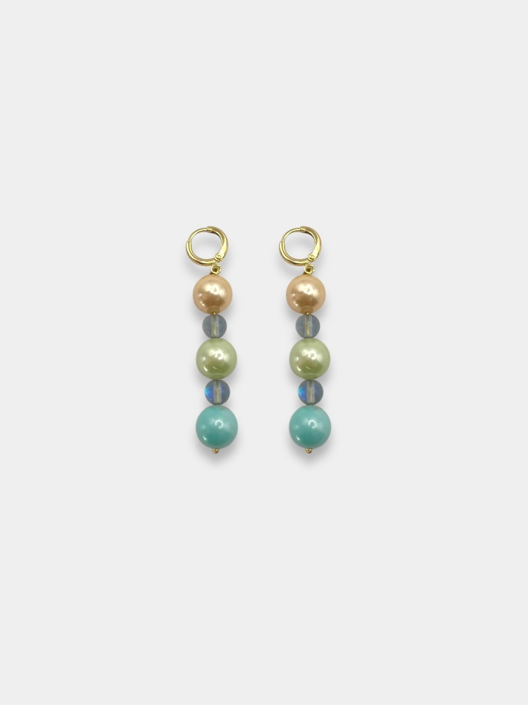 Aretes perla.