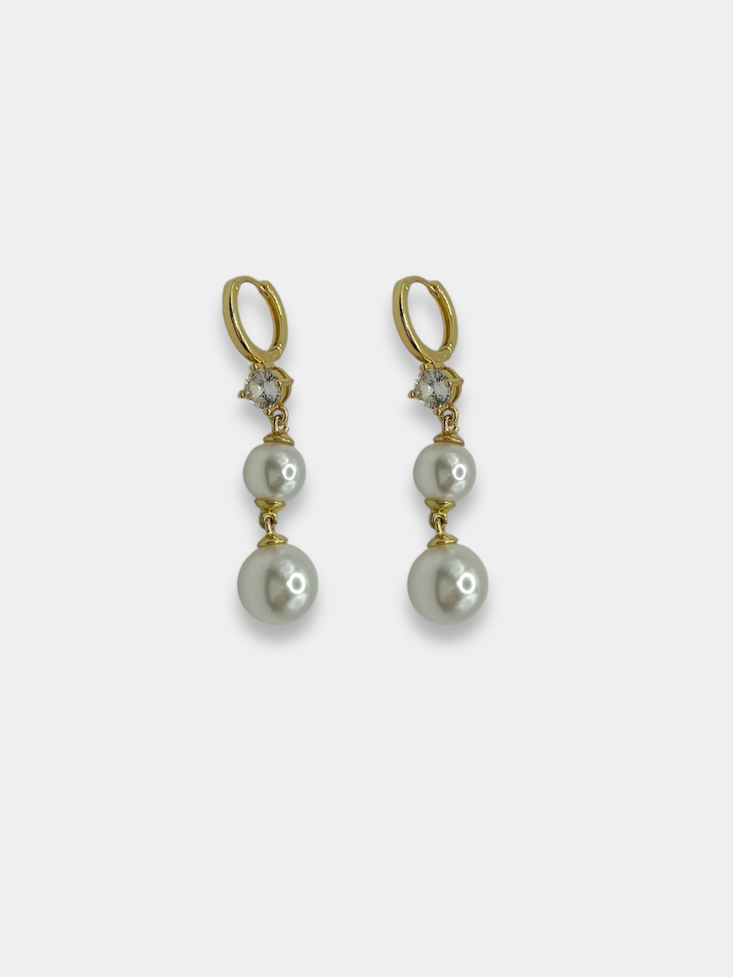 Aretes colgantes perlas.