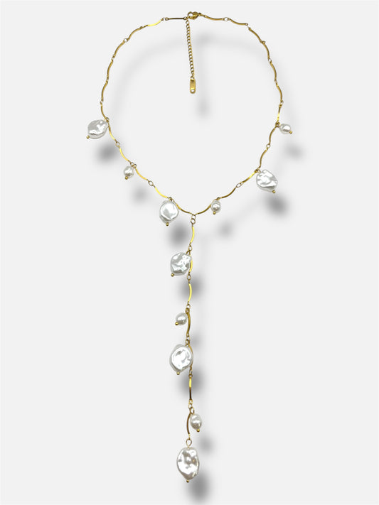Collar perlas.