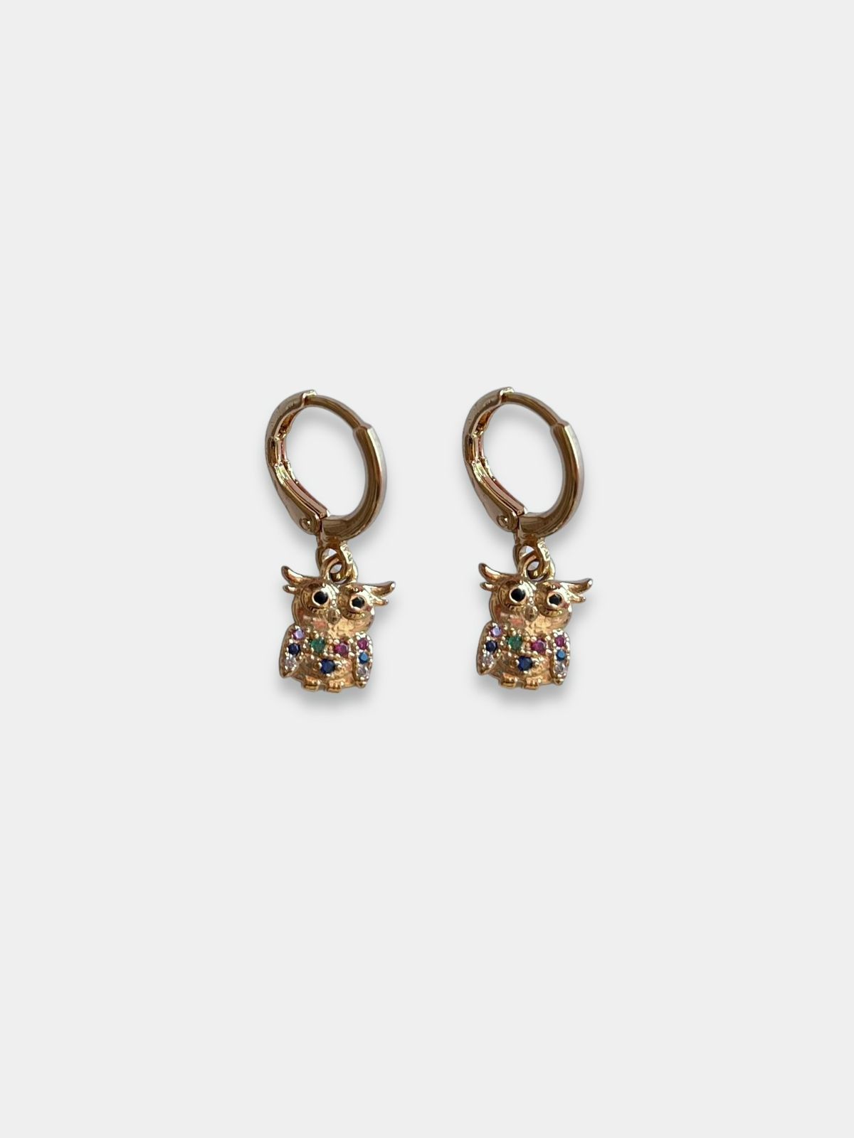 Aretes dorados búho