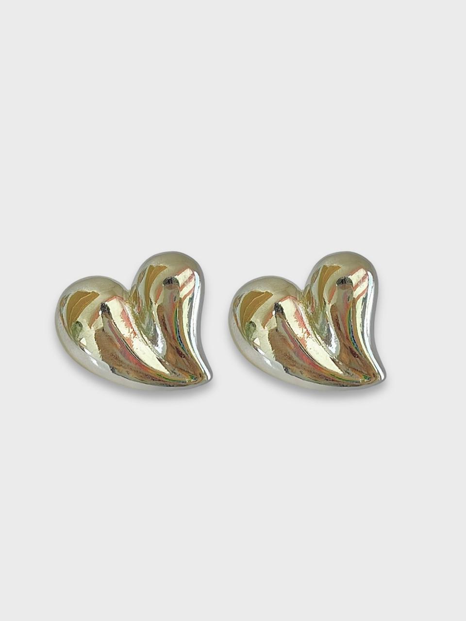 Aretes corazon plateados