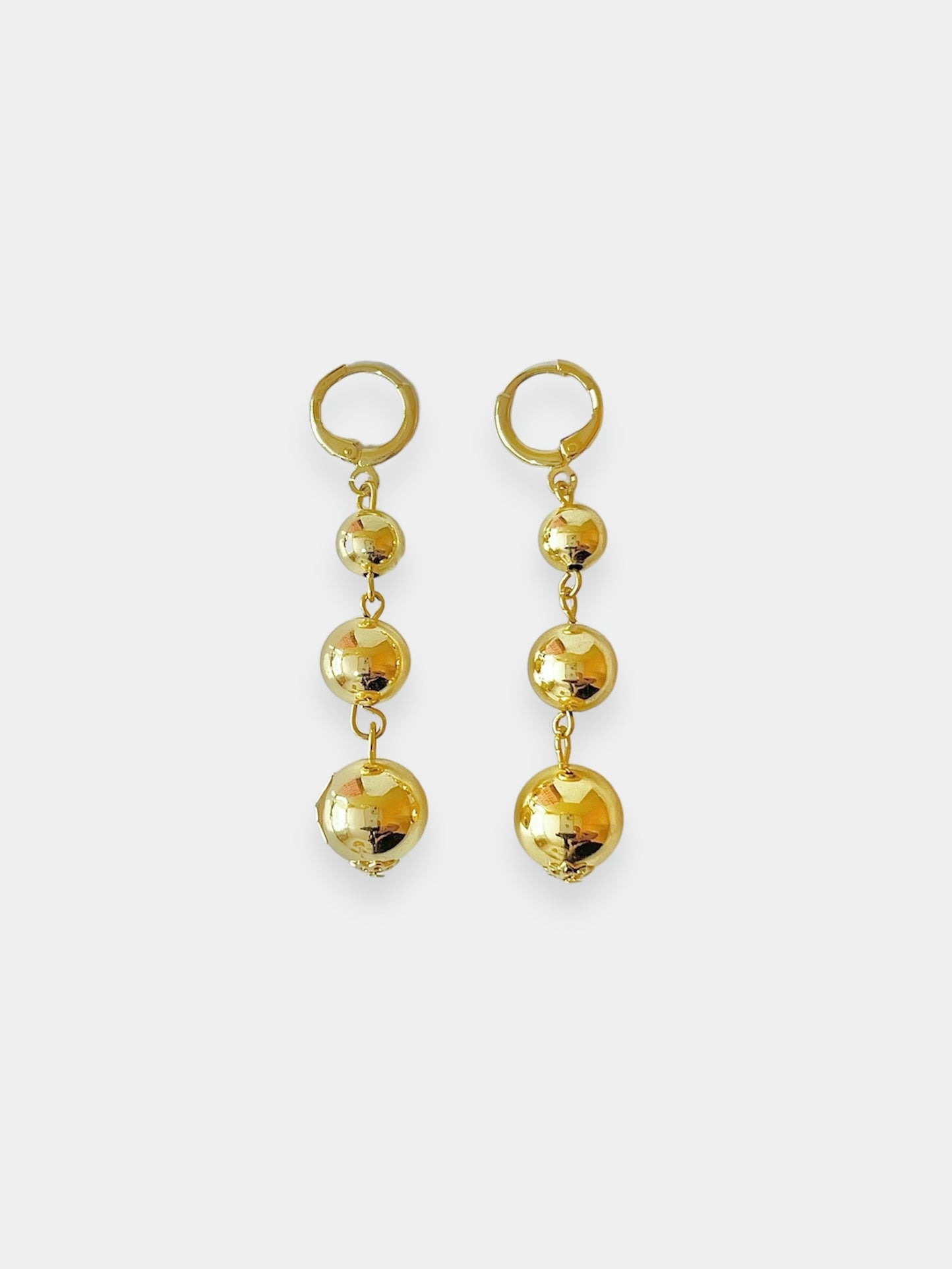 Aretes bolitas doradas