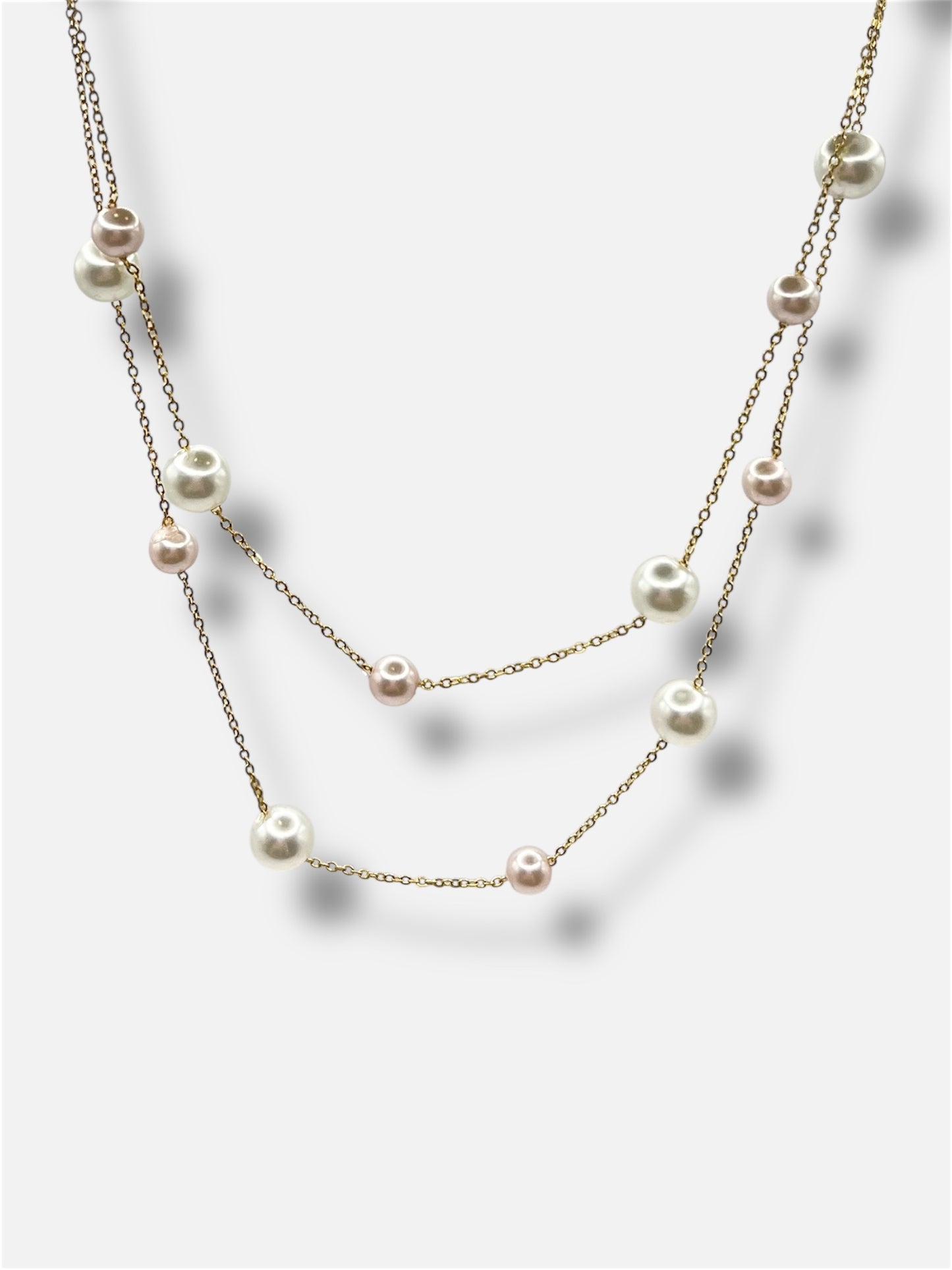 Collar doble perlas.