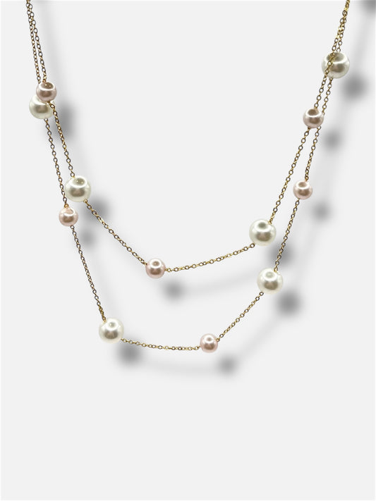 Collar doble perlas.