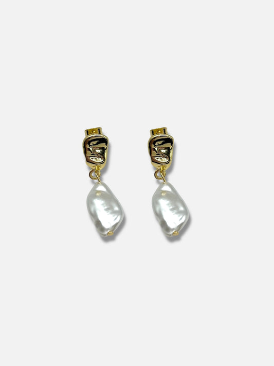 Aretes perla.